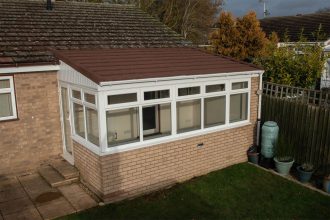 Brown conservatory roof lean to