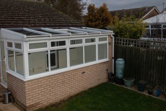 Lean to glass roof conservatory